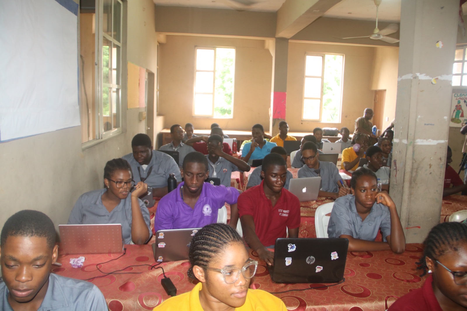 Students coding at BrightPath Foundation Build Your First Website Workshop
